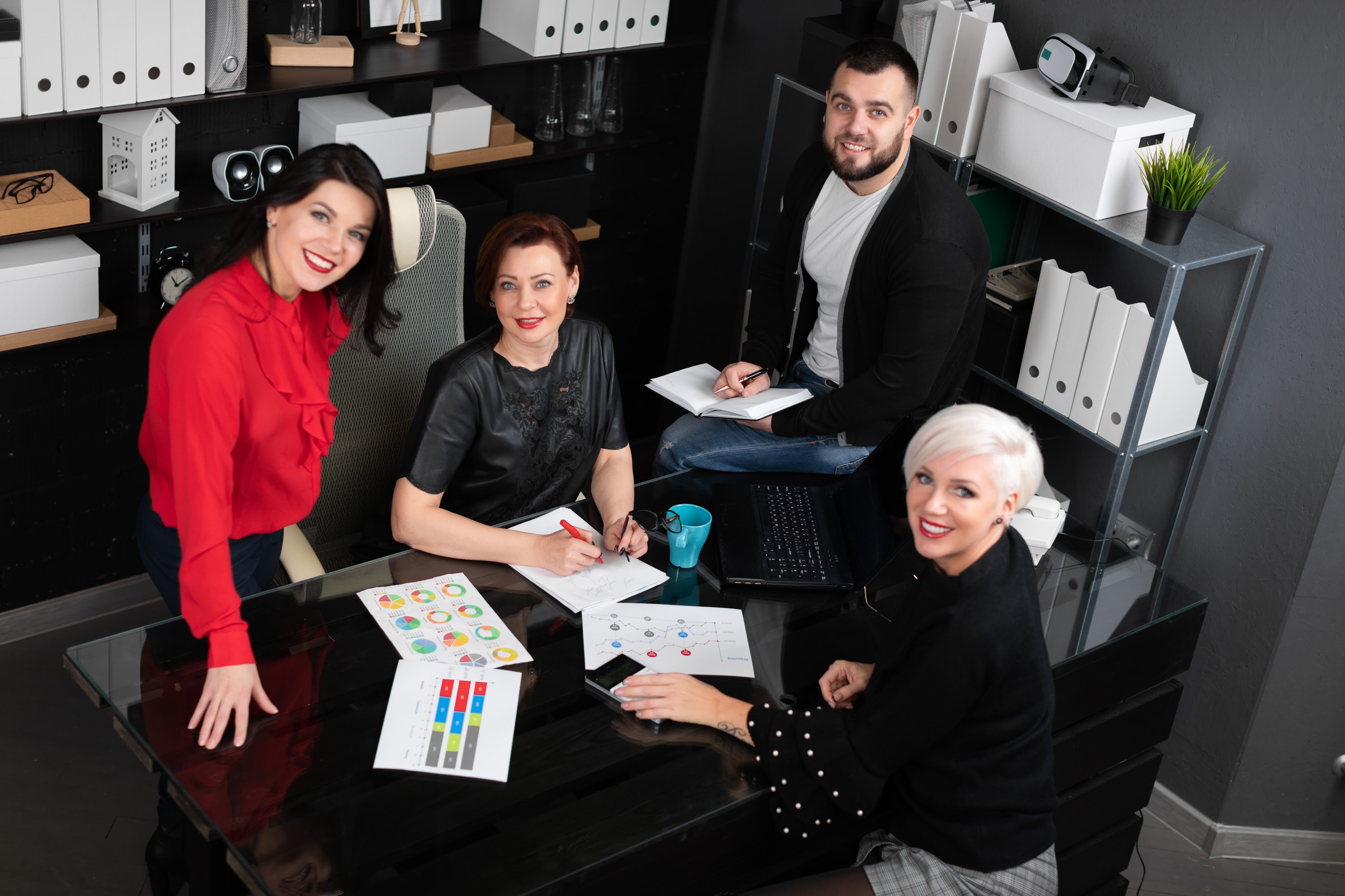 portrait-of-smiling-employees-in-workplace-2023-11-27-05-21-15-utc.jpg