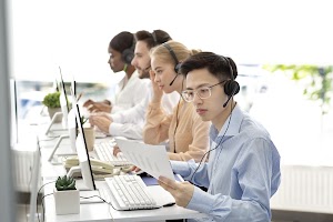 asian-hotline-operator-working-with-documents-pro-2023-11-27-05-32-57-utc.jpg