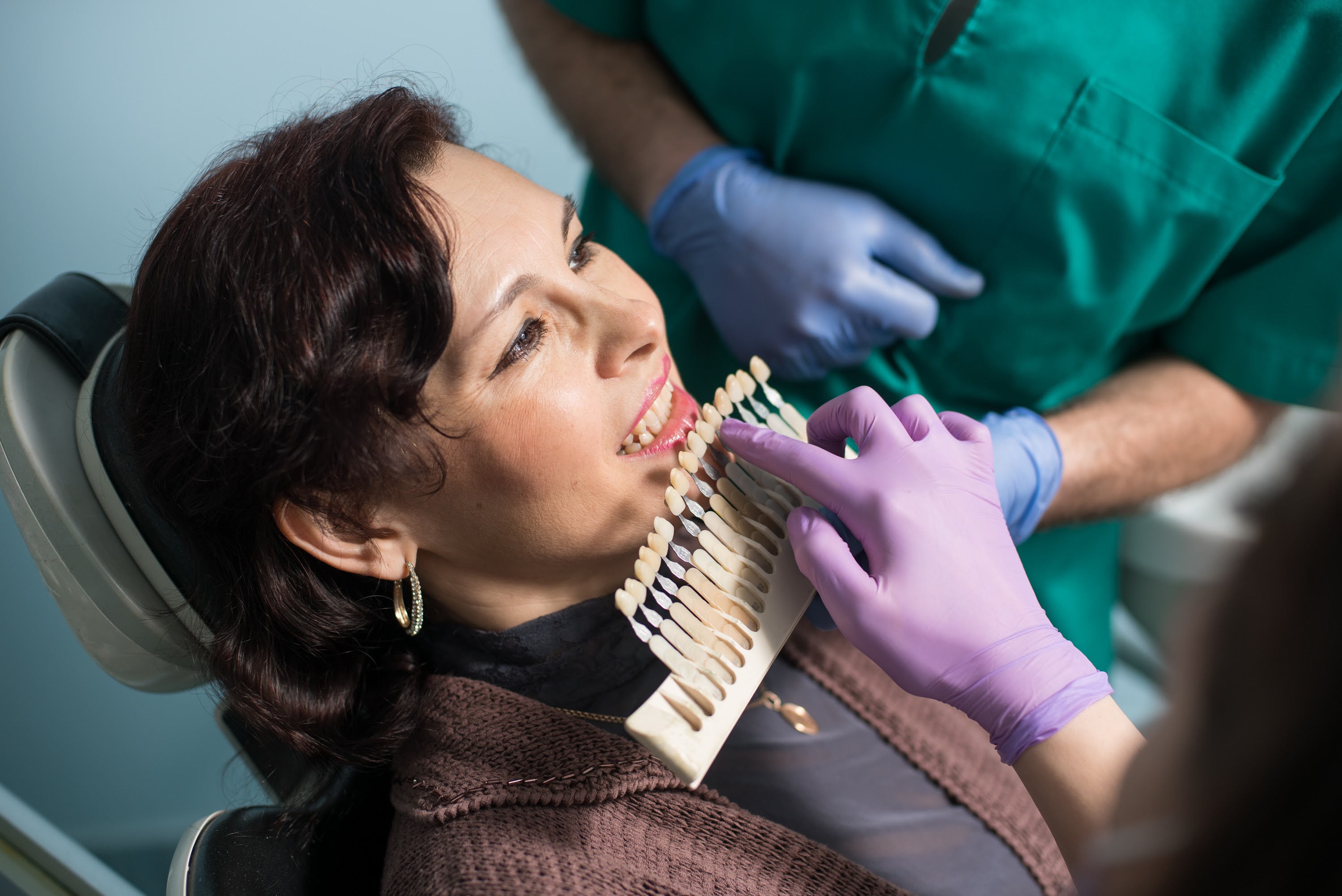 female-patient-checking-and-selecting-colour-of-th-2025-01-16-23-22-25-utc.jpg