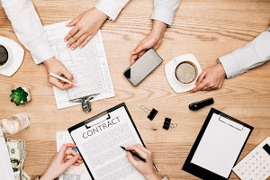 top-view-of-business-partners-with-contract-paper-2024-11-07-20-31-13-utc.jpg