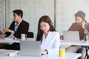 young-asian-woman-working-in-call-centre-surround-2025-01-10-11-22-18-utc.jpg