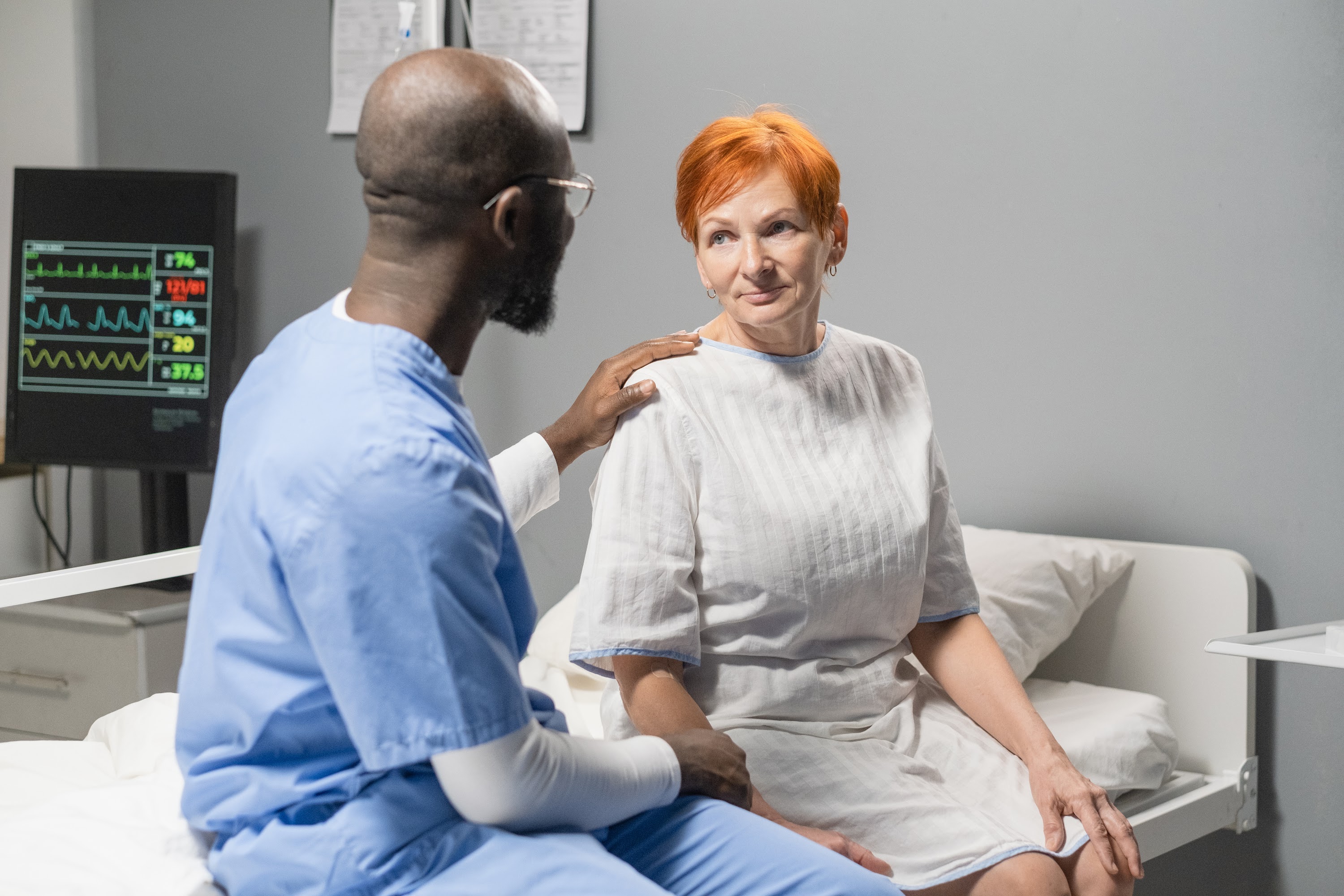 doctor-talking-to-patient-at-hospital-ward-2023-11-27-05-35-58-utc.JPG