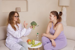 nutritionist-and-young-woman-discussing-healthy-ea-2025-02-19-19-25-51-utc.jpg