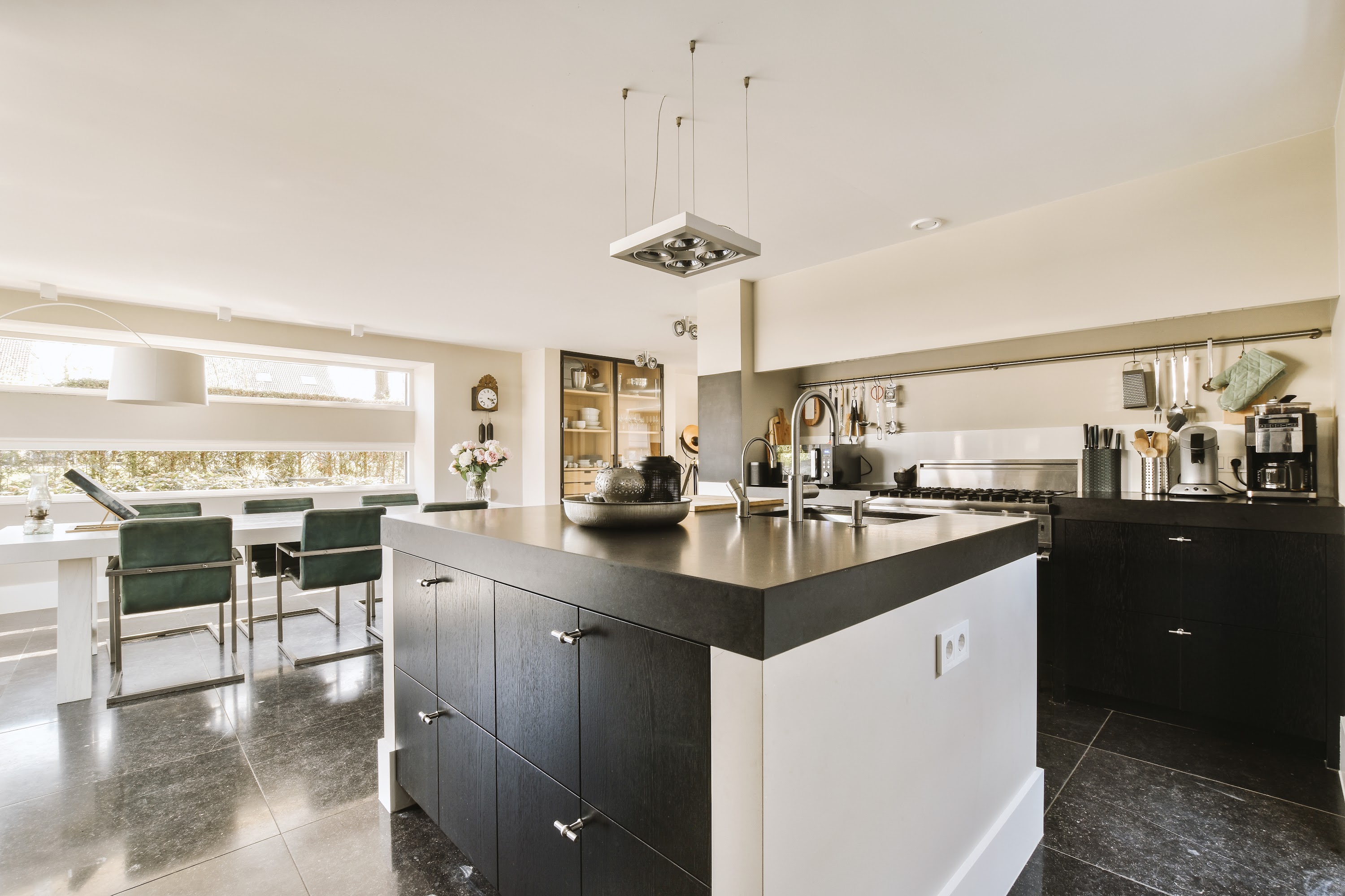 a-large-kitchen-with-an-island-and-a-dining-room-2025-02-10-13-29-23-utc.jpg