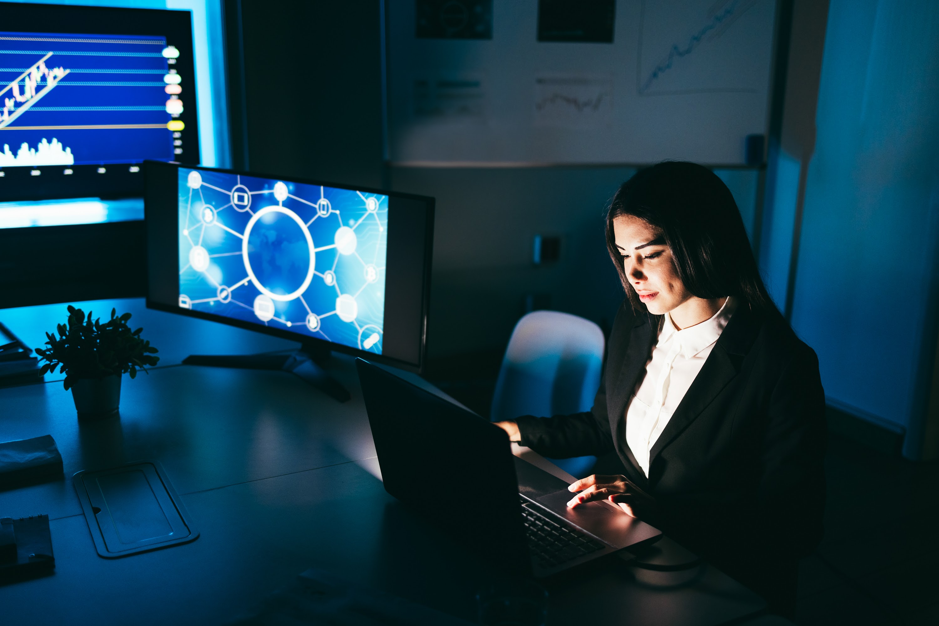 young-business-woman-working-at-night-inside-finte-2025-02-22-05-02-42-utc.jpg