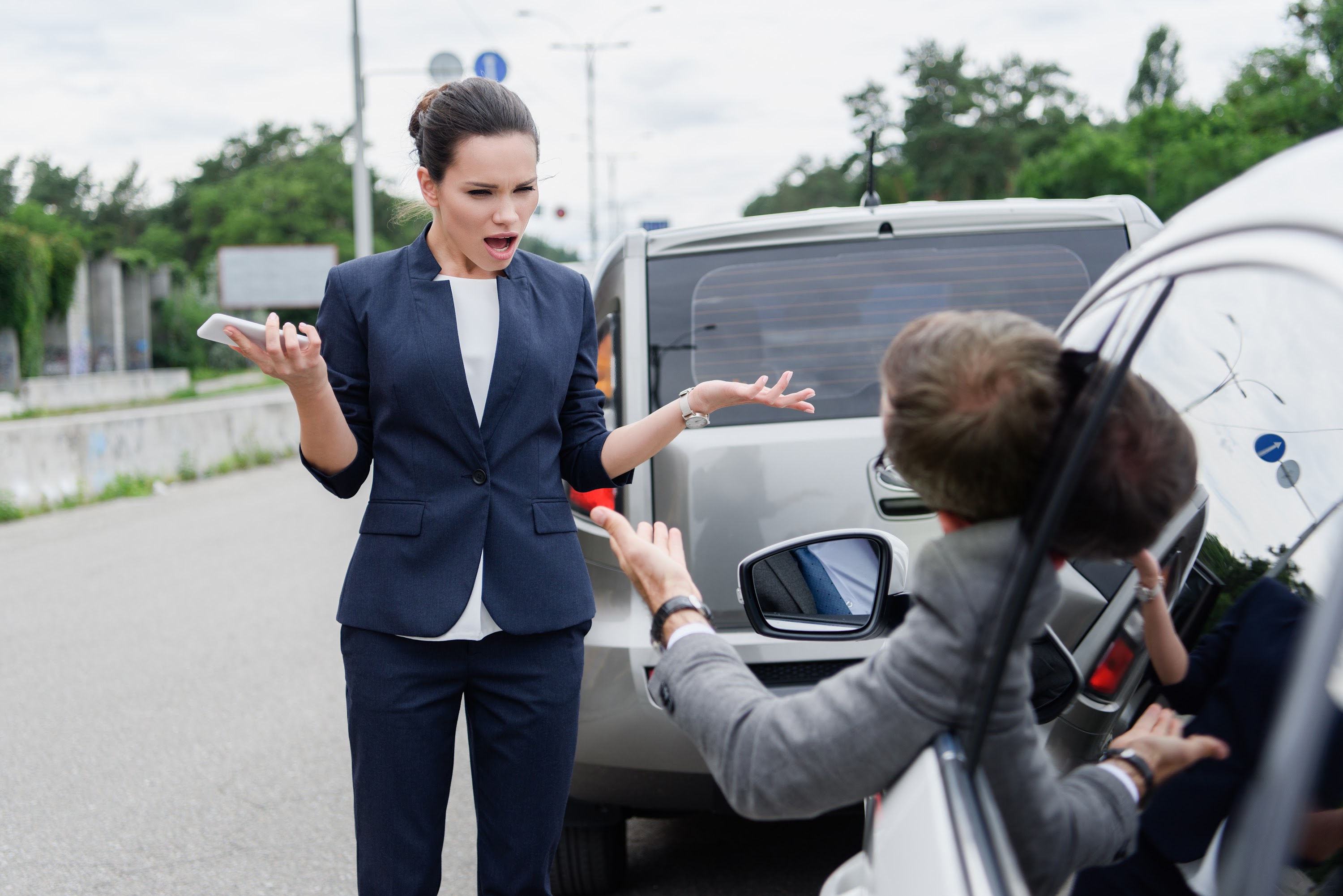 businesspeople-screaming-on-road-after-car-acciden-2024-11-18-01-31-17-utc.jpg
