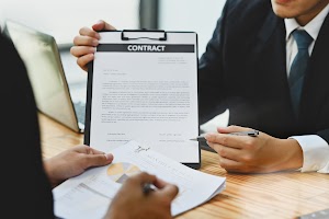 real-estate-agent-or-bank-worker-showing-contract-2024-11-28-11-23-22-utc.jpg