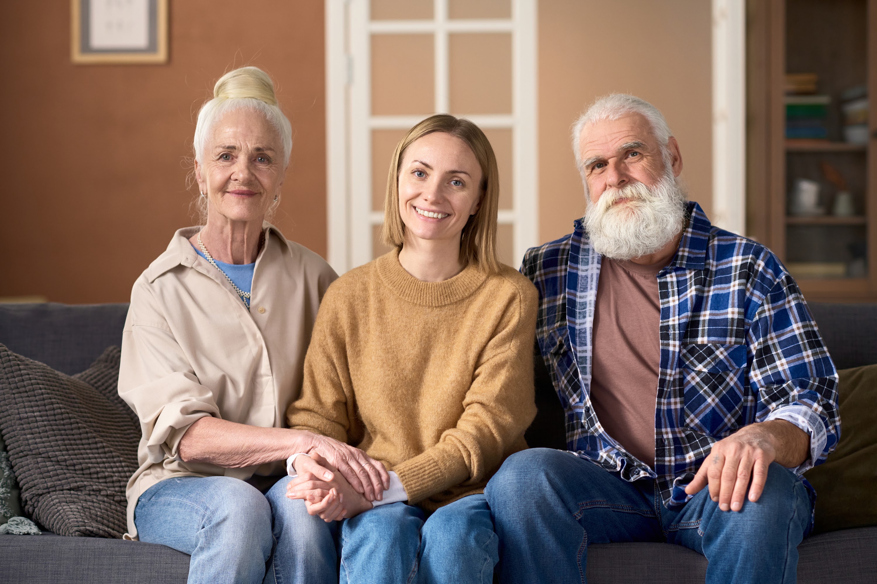 senior-parents-spending-time-with-daughter-2023-11-27-05-06-01-utc.jpg