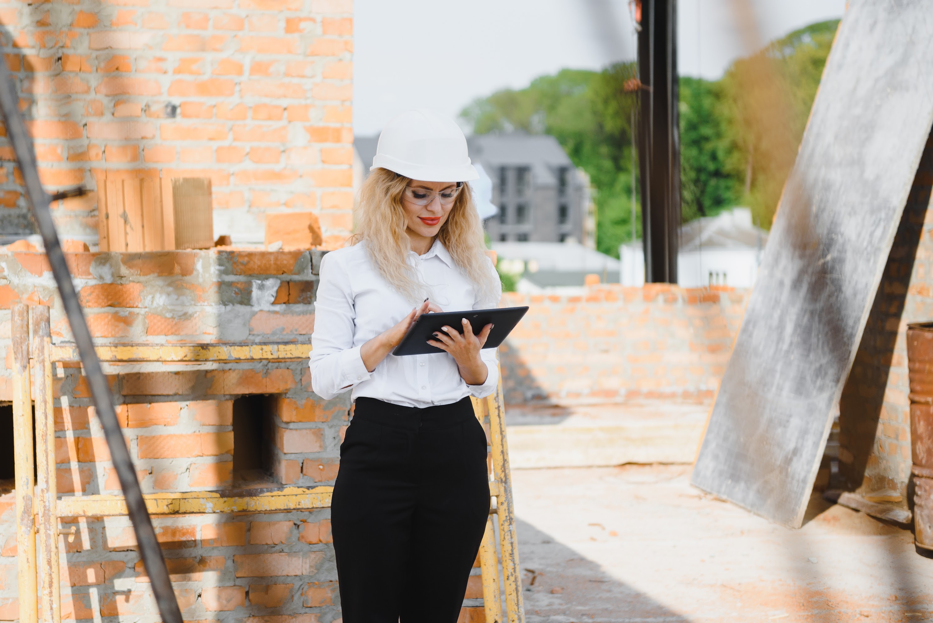women-engineer-look-at-building-glass-2025-03-14-13-53-37-utc.jpg