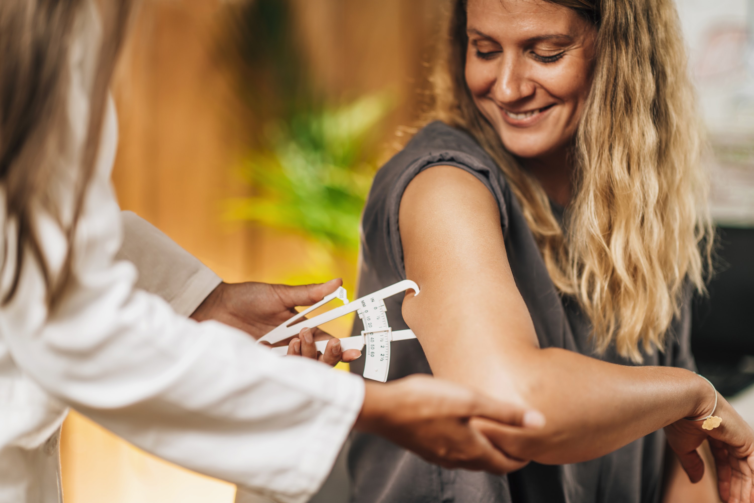 body-fat-test-using-caliper-on-the-female-patient-2024-10-18-11-22-37-utc.jpg