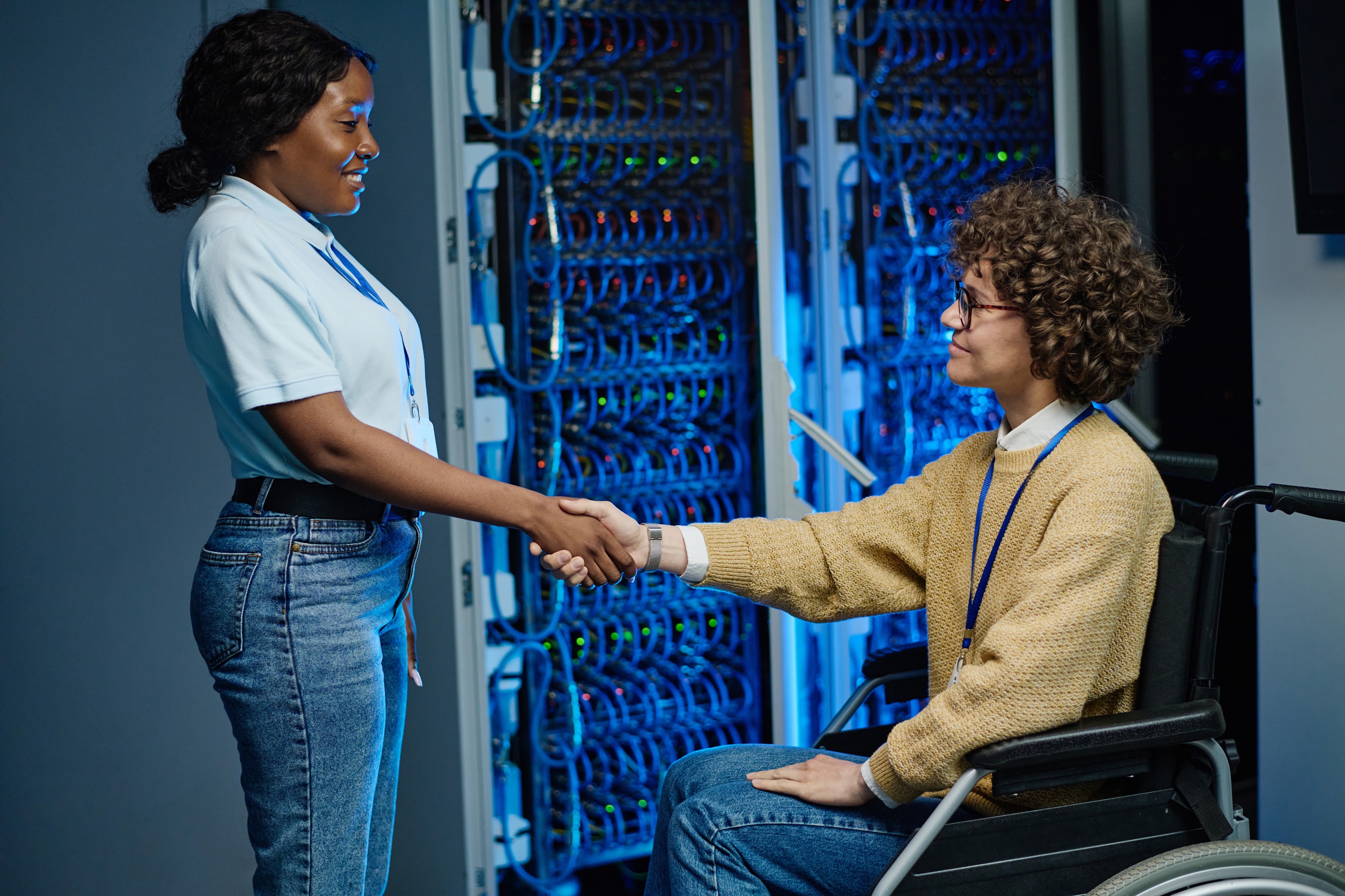 engineer-shaking-hands-with-server-worker-in-data-2025-02-11-15-43-15-utc.jpg