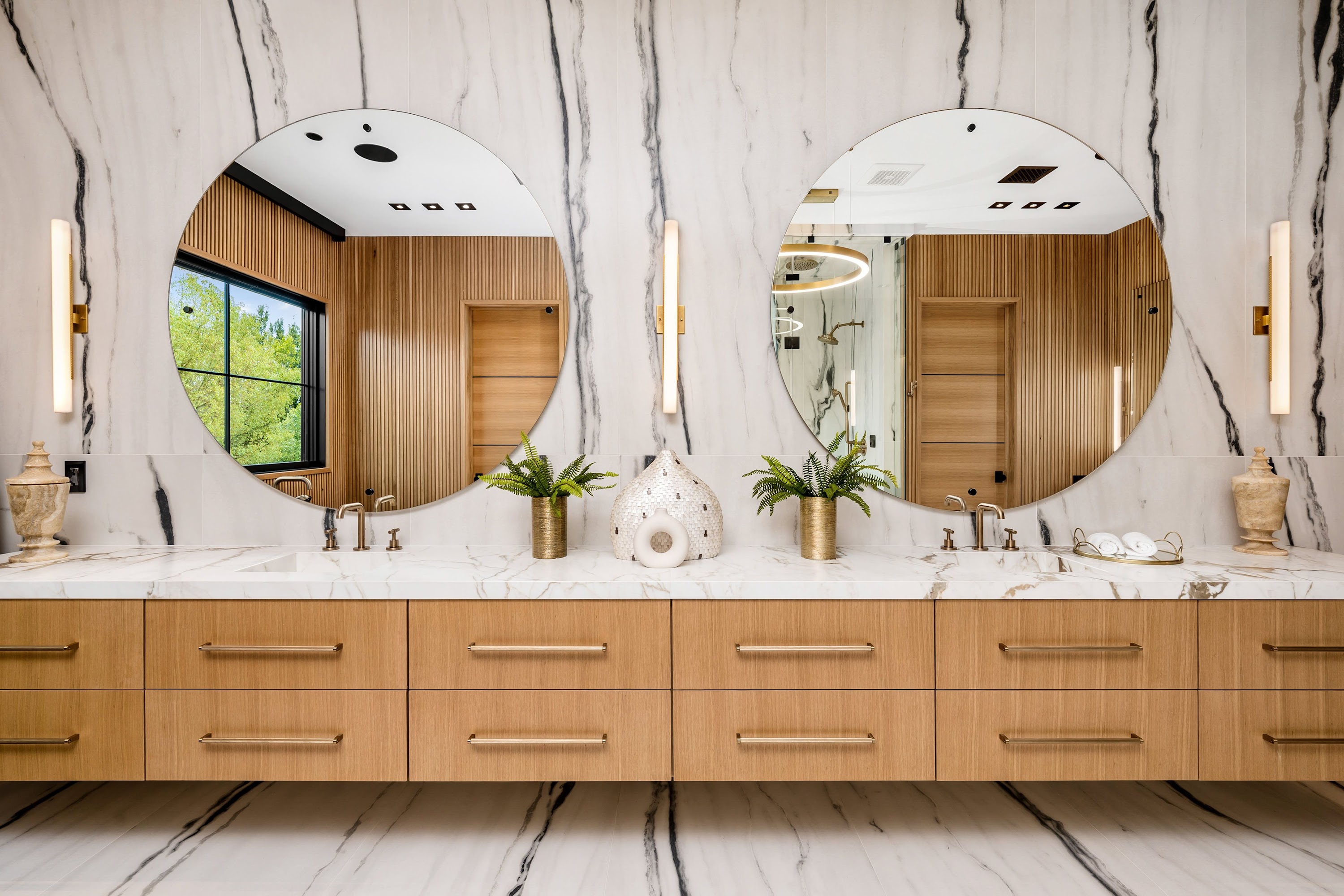 modern-bathroom-with-double-vanity-and-round-mirro-2025-02-10-06-40-08-utc.jpg