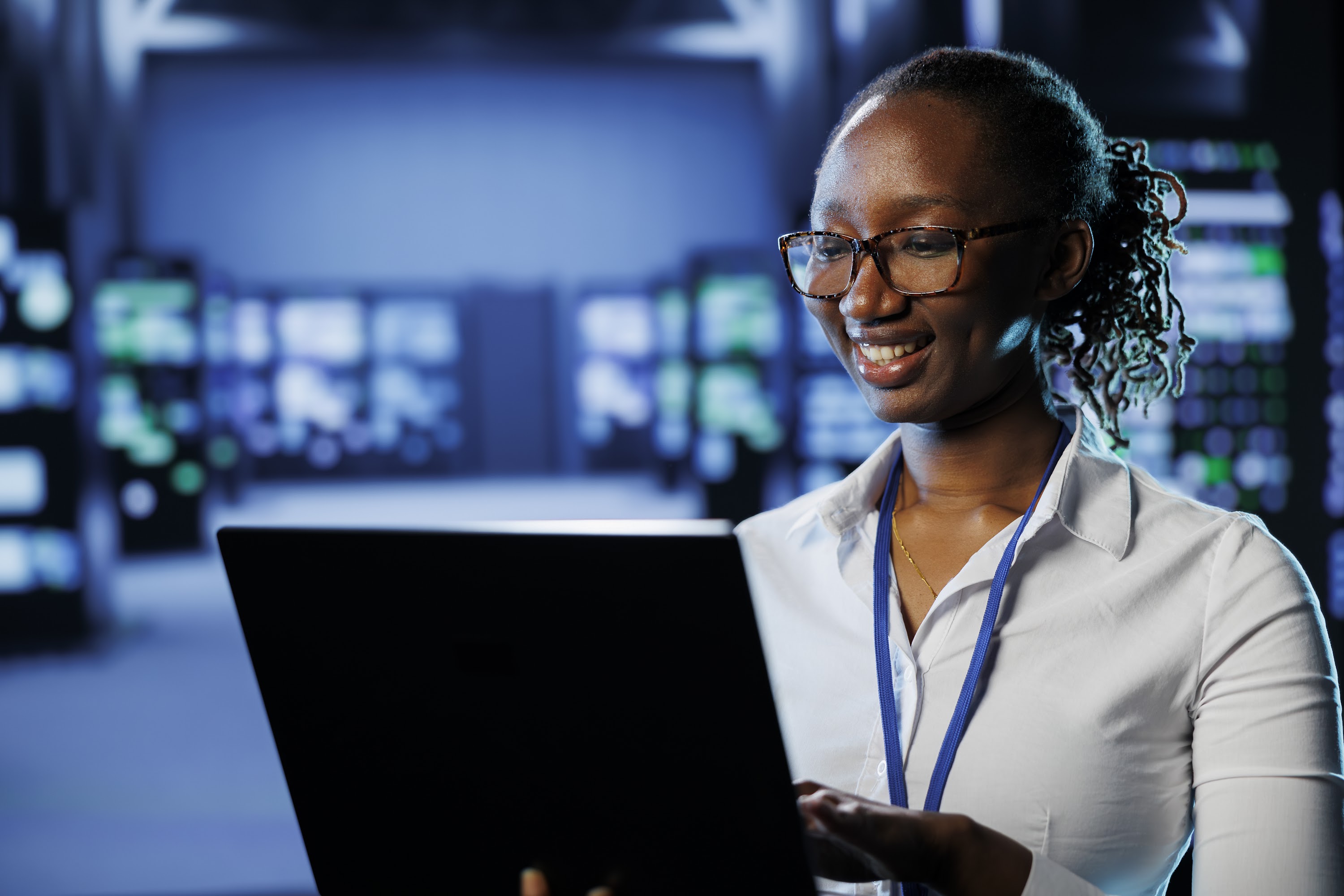 woman-in-data-center-with-laptop-2025-02-20-06-08-57-utc.jpg