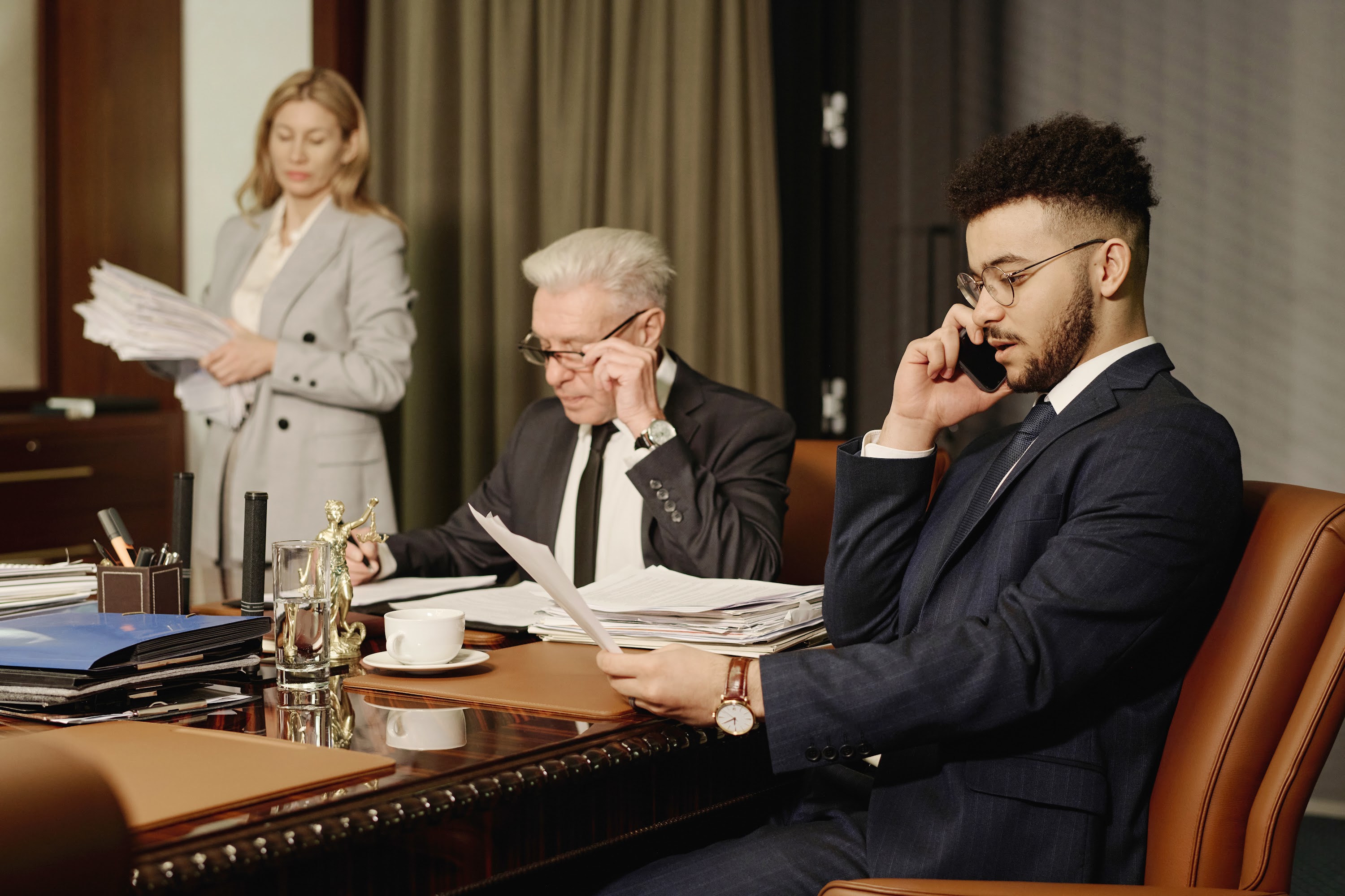 biracial-group-of-business-people-working-with-pap-2025-02-11-15-36-02-utc.jpg