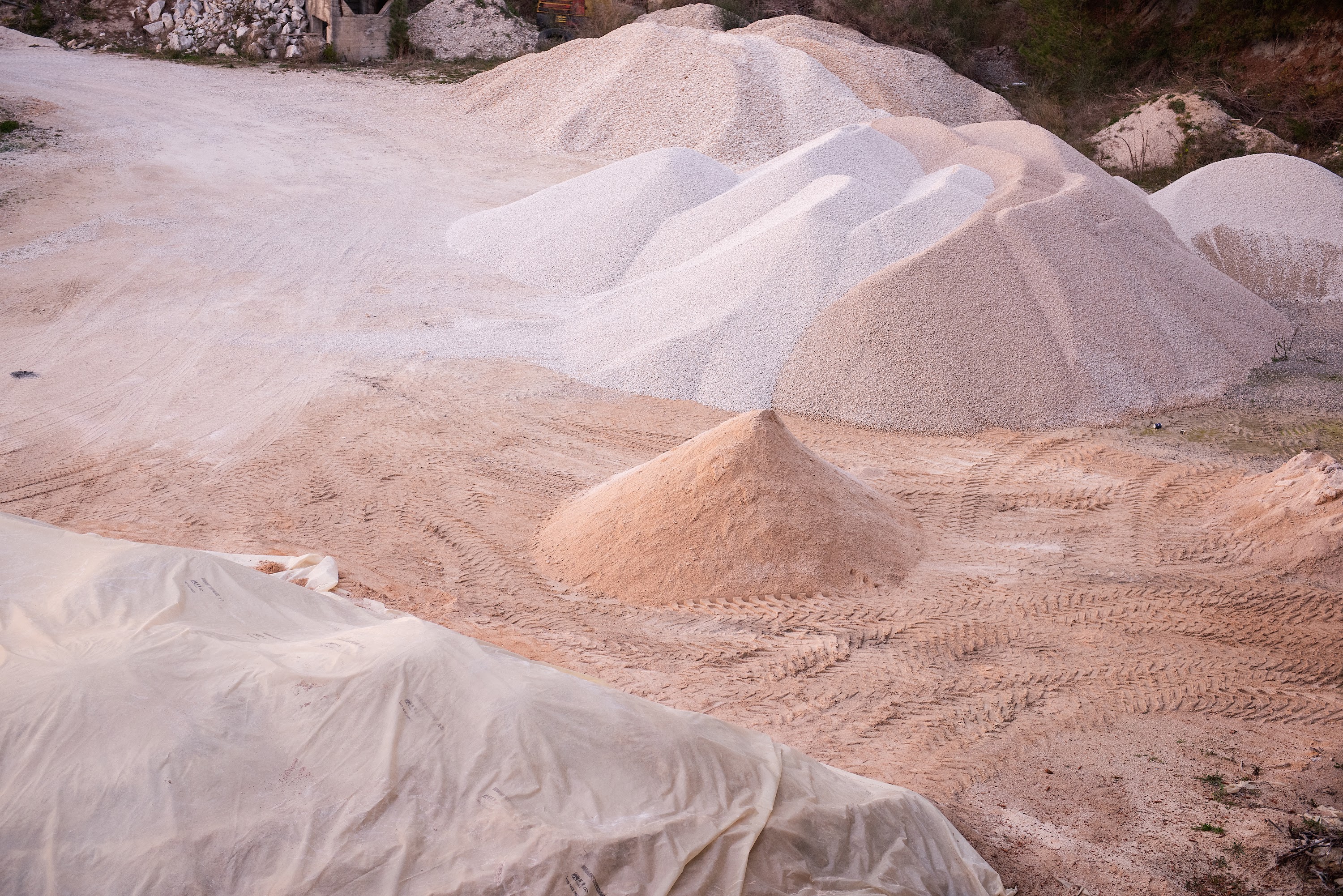 gravel-and-sand-piles-at-a-construction-site-at-a-2025-03-15-04-07-13-utc.jpg
