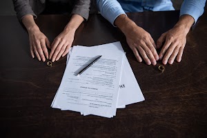 partial-view-of-couple-at-table-with-divorce-docum-2024-11-19-07-15-02-utc.jpg