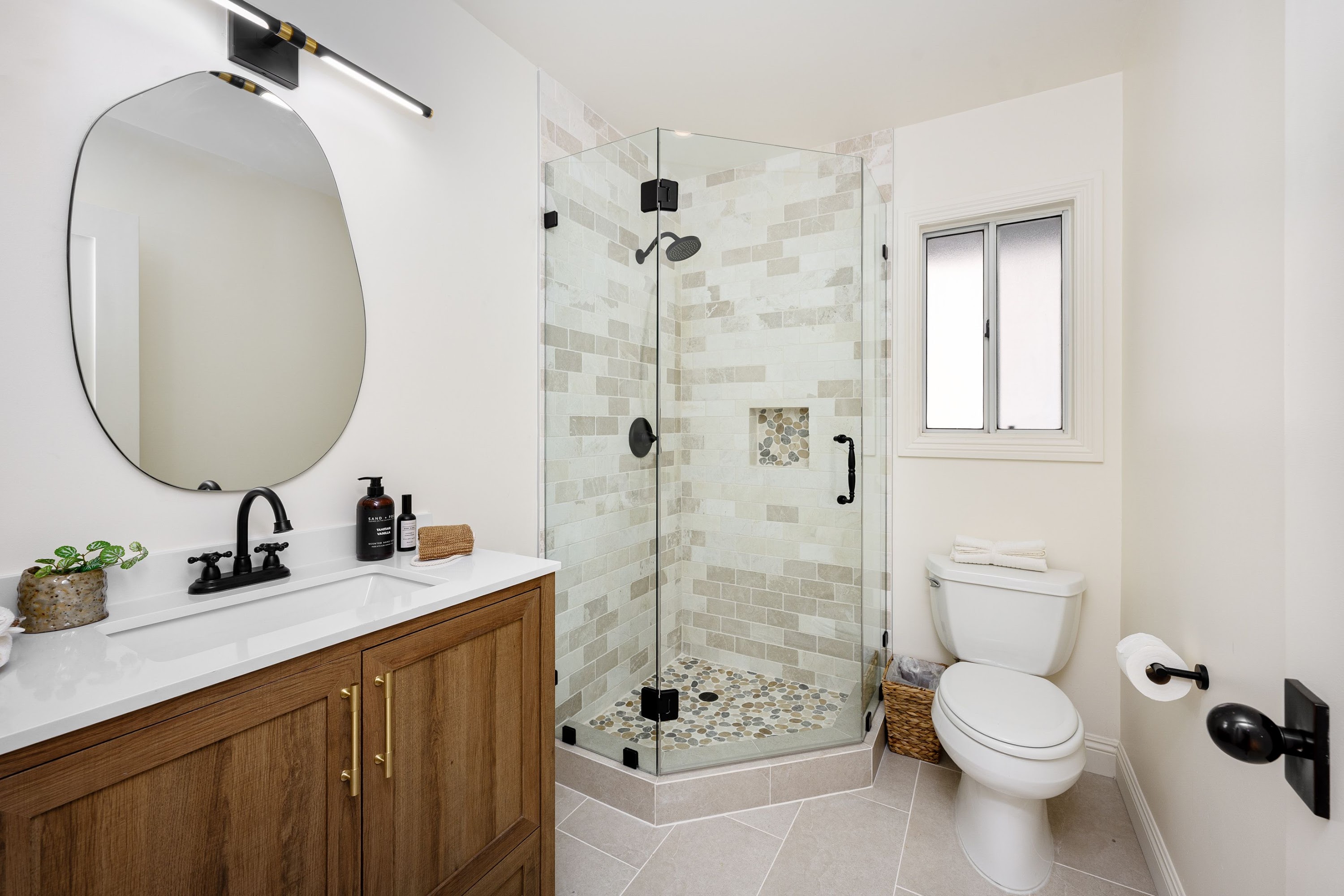 modern-bathroom-interior-with-glass-shower-wooden-2025-02-10-06-22-59-utc.jpg