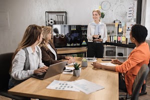 multiracial-female-business-people-having-briefing-2024-12-13-03-21-16-utc.jpg