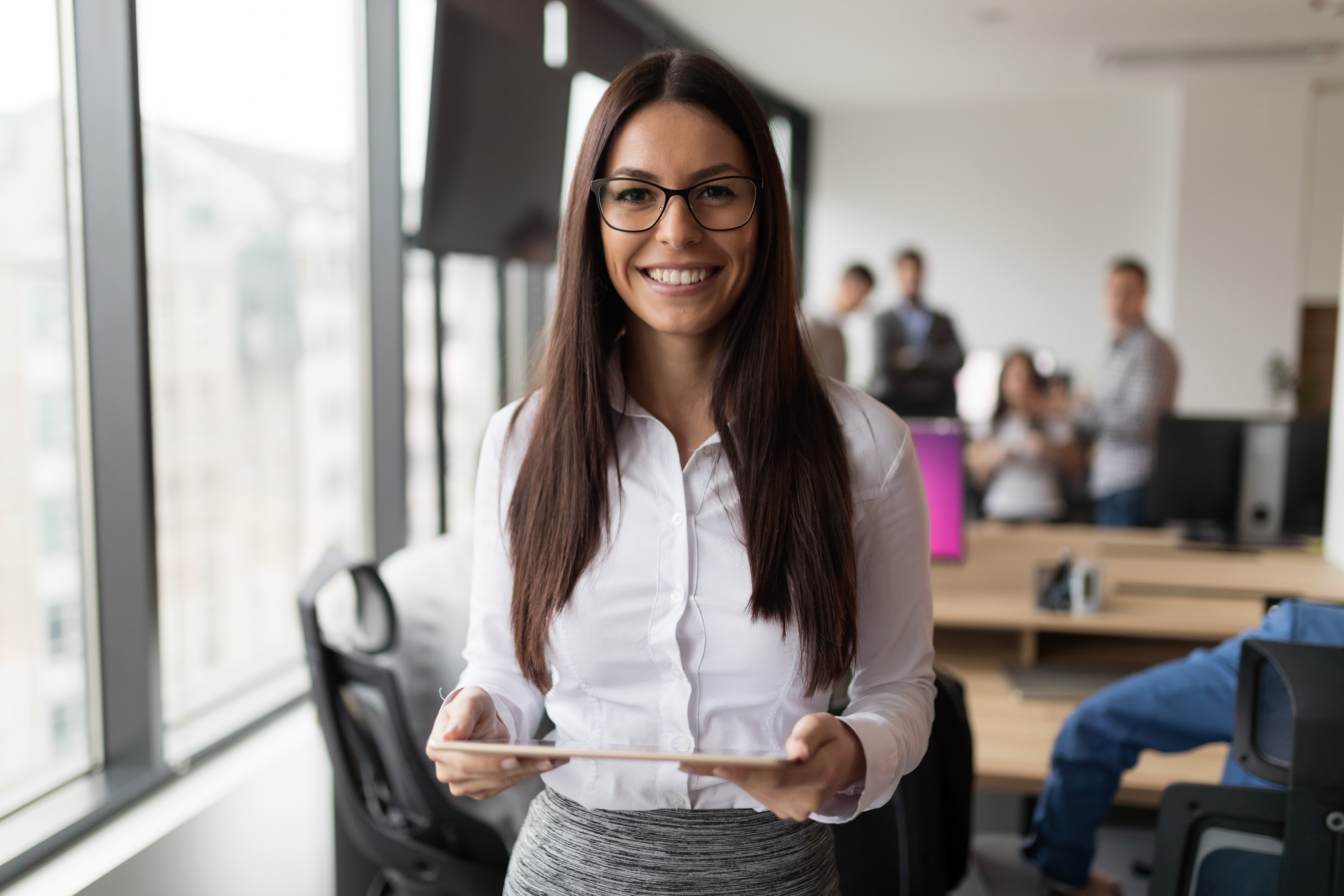 portrait-of-successful-businesswoman-holding-digit-2025-03-16-00-15-27-utc.jpg
