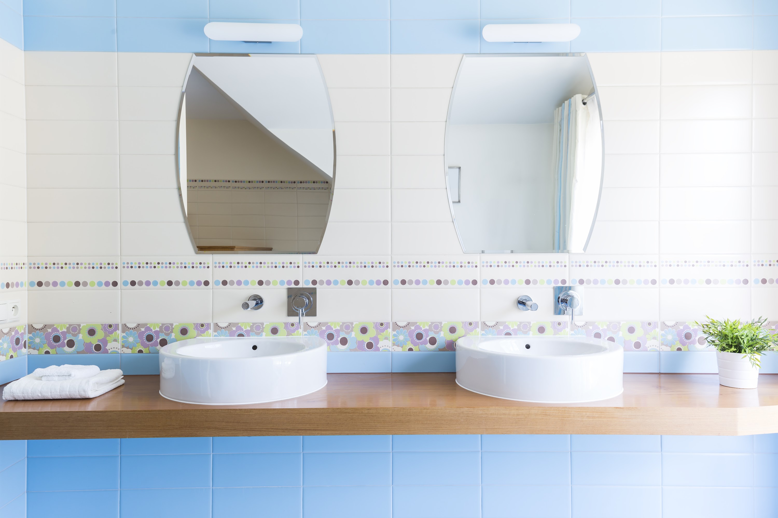 two-sinks-with-mirrors-in-the-minimalist-bathroom-2024-10-18-09-02-35-utc.jpg