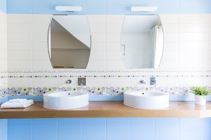 two-sinks-with-mirrors-in-the-minimalist-bathroom-2024-10-18-09-02-35-utc.jpg