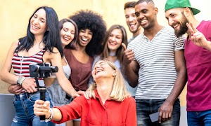 multiracial-young-friends-taking-selfie-with-mobil-2024-07-03-02-44-11-utc.jpg