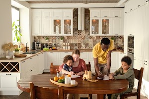 two-young-intercultural-parents-teaching-their-son-2025-03-16-11-01-54-utc.jpg
