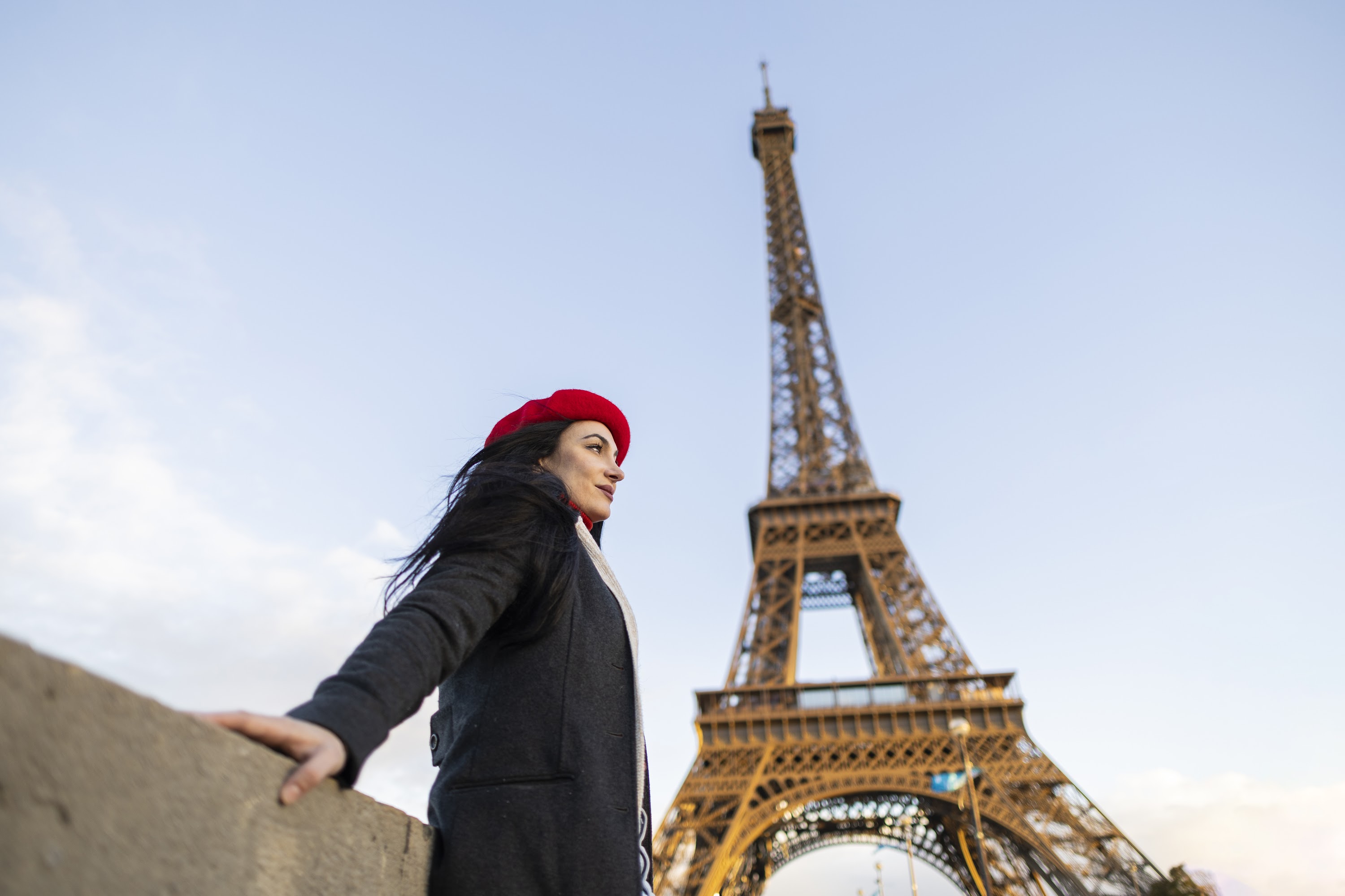 a-stylish-woman-in-a-red-beret-leans-on-a-ledge-a-2025-02-21-07-49-19-utc.JPG