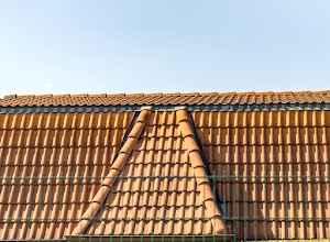 roofline-with-shingles-against-blue-sky-with-copy-2025-01-08-15-16-02-utc.jpg