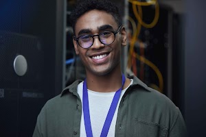 cropped-portrait-of-a-handsome-male-it-support-age-2025-04-06-03-03-35-utc (1).jpg