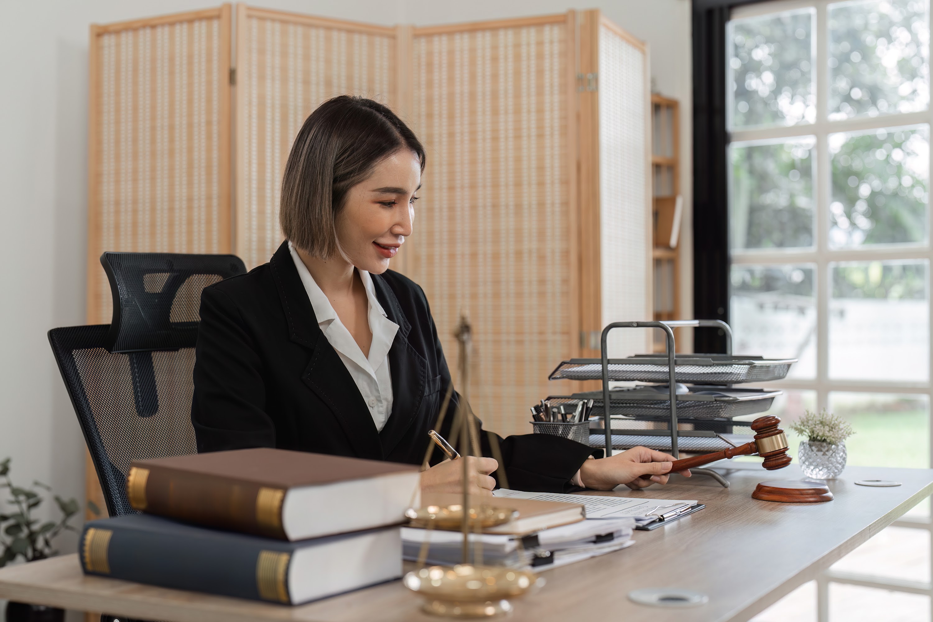 professional-female-lawyer-working-at-desk-in-mode-2025-01-16-13-27-58-utc.jpg