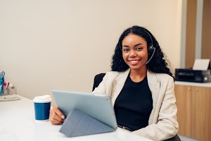 woman-call-center-operator-with-headset-using-comp-2025-01-31-02-59-45-utc.jpg