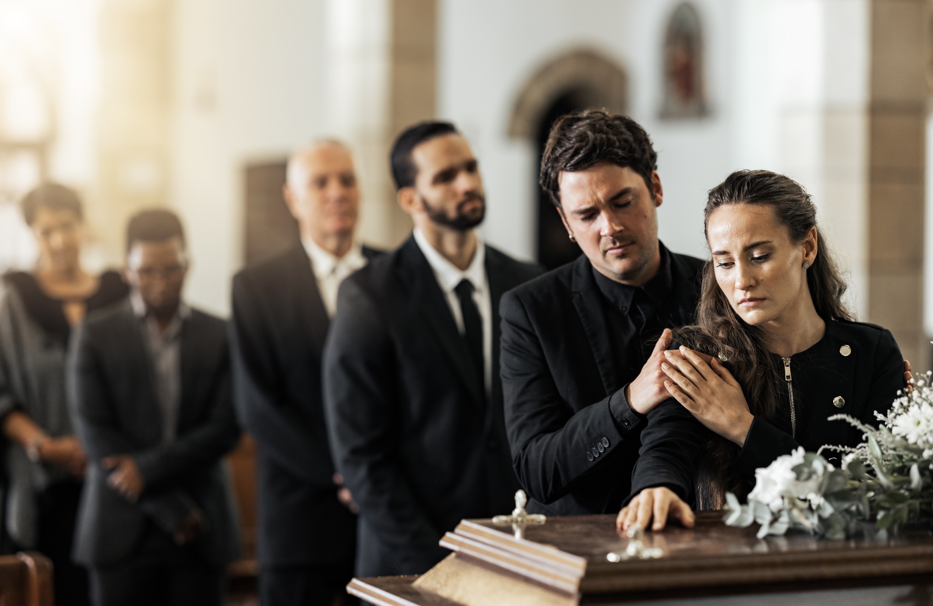 death-funeral-and-family-touching-coffin-in-a-chu-2025-04-06-07-29-51-utc.jpg