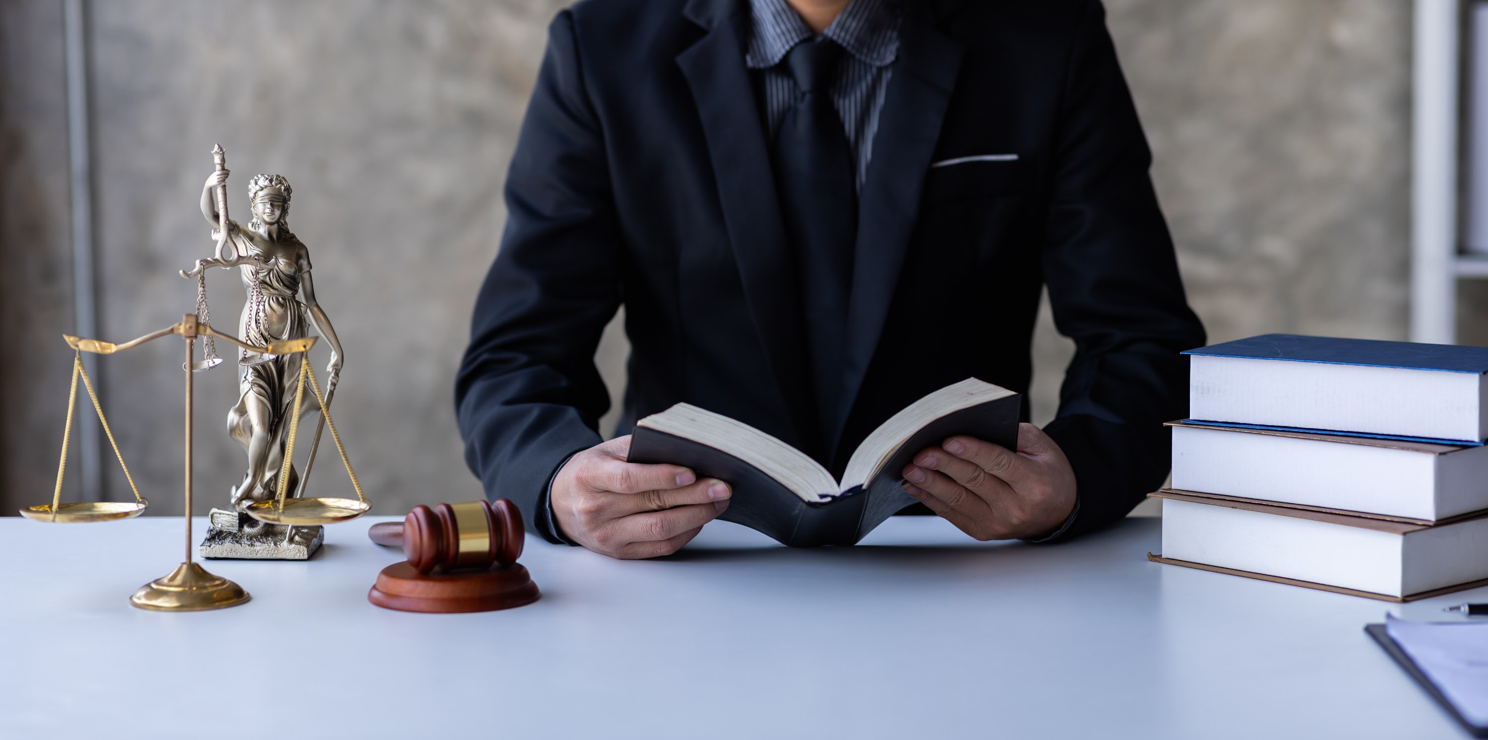 lawyer-working-in-office-statue-of-justice-law-2025-02-22-16-08-43-utc.JPG