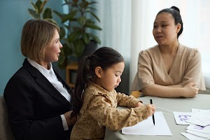 educating-young-child-with-teacher-and-parent-obse-2025-04-11-18-36-44-utc.jpg