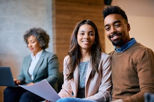happy-black-couple-on-a-meeting-with-financial-adv-2024-12-13-17-10-44-utc.jpg
