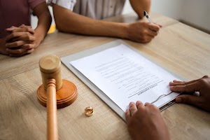 lawyer-giving-documents-to-husband-and-wife-who-ar-2025-06-26-00-02-03-utc.jpg