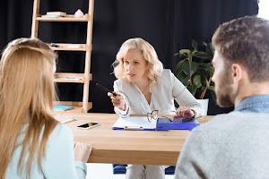 mature-female-psychologist-talking-with-young-coup-2024-11-18-10-16-31-utc.jpg