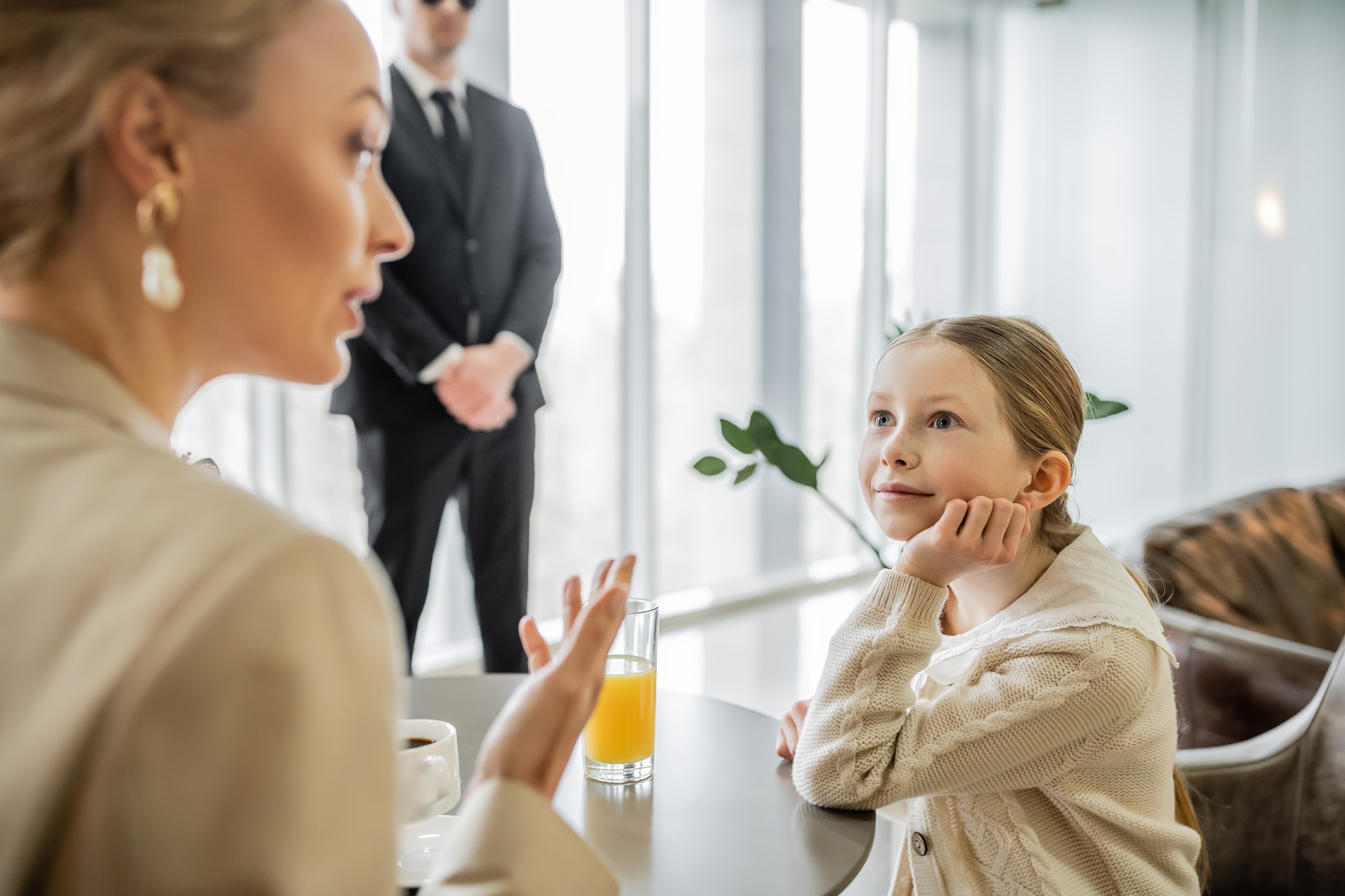 preteen-girl-listening-to-blonde-mother-attentivel-2024-11-11-18-21-57-utc.jpg