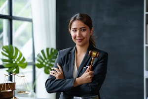 beautiful-asian-woman-lawyer-sitting-at-a-table-sm-2025-03-05-10-38-52-utc.jpg