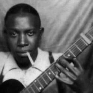 A classic photo of Robert Johnson, discovered in the 1990s I believe, of him with a cigarette in his mouth, posing casually