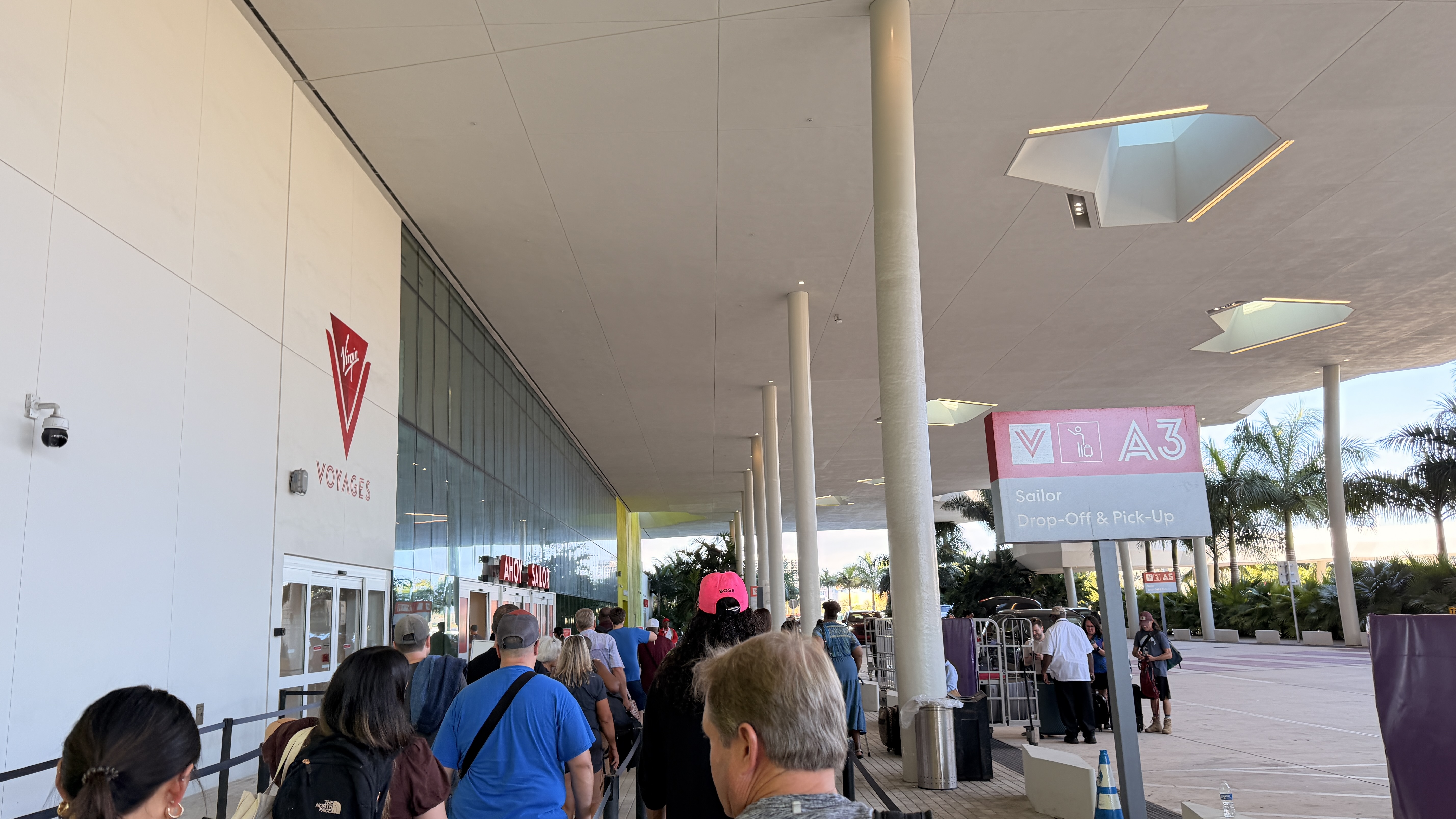 Miami cruise terminal exterior or interior with passengers checking in horizontal