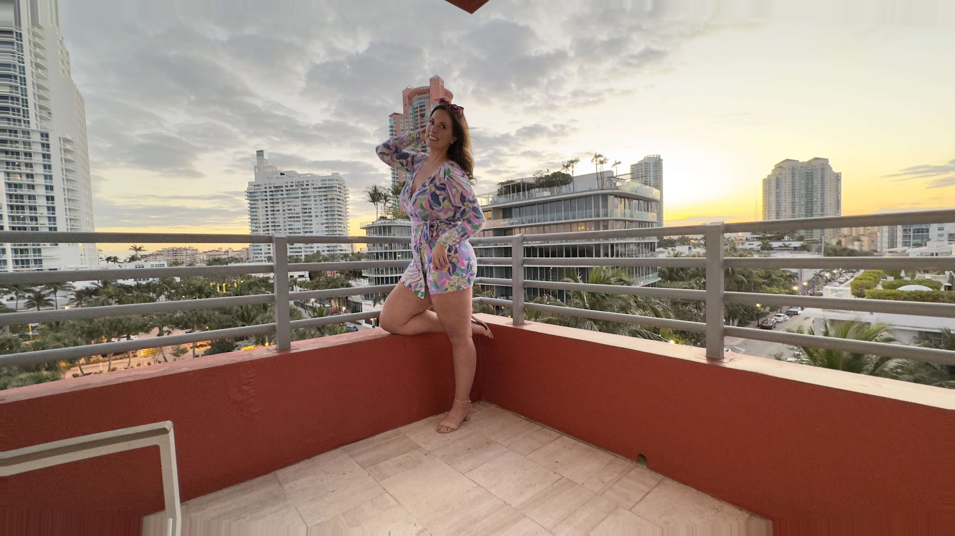 Melissa at a Miami hotel rooftop pool or Brickell balcony with city view