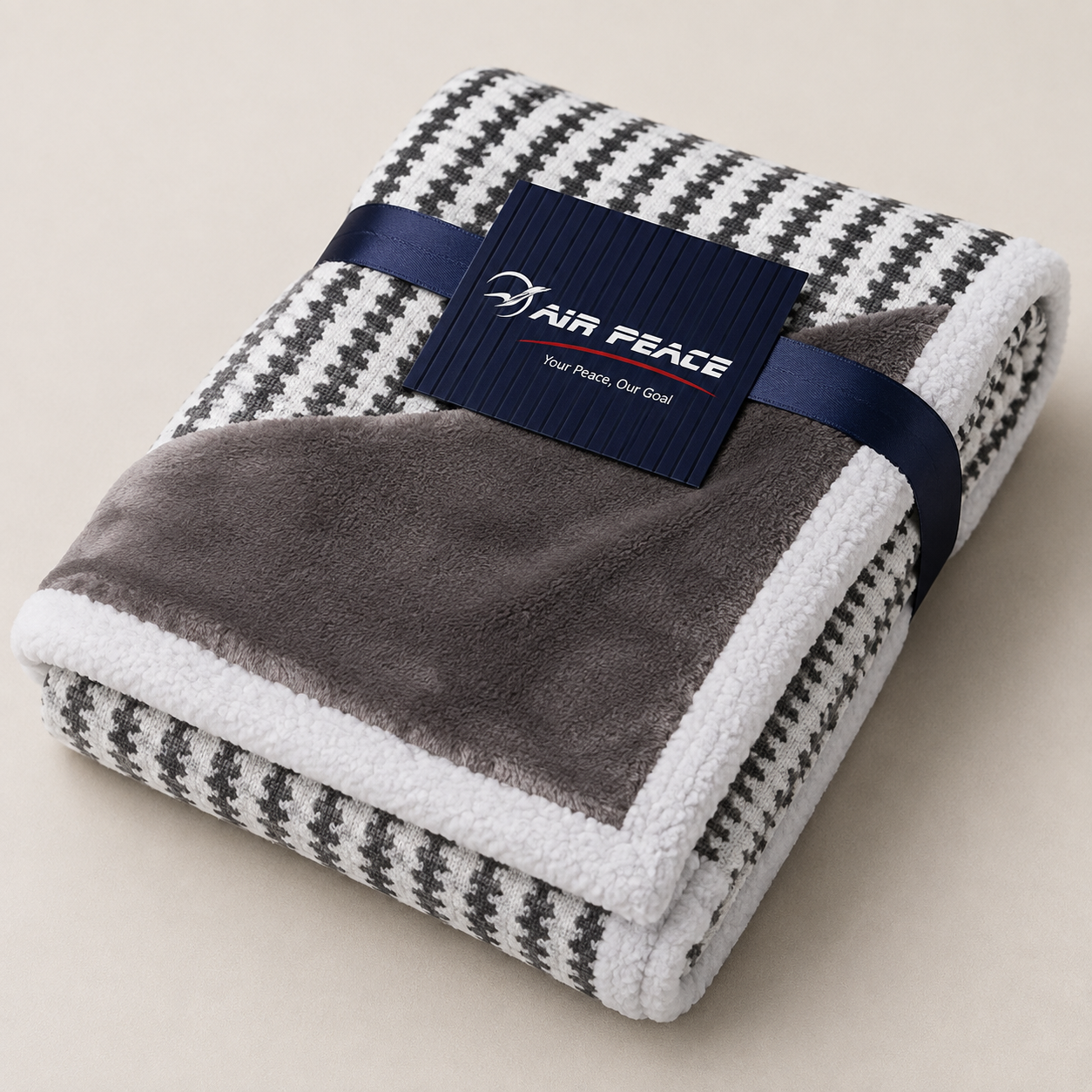Air Peace sherpa blanket from RibiRewards' December collection