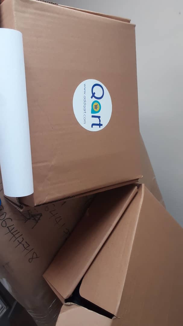 Qart branded shipping boxes stacked and ready for the CodeLN order