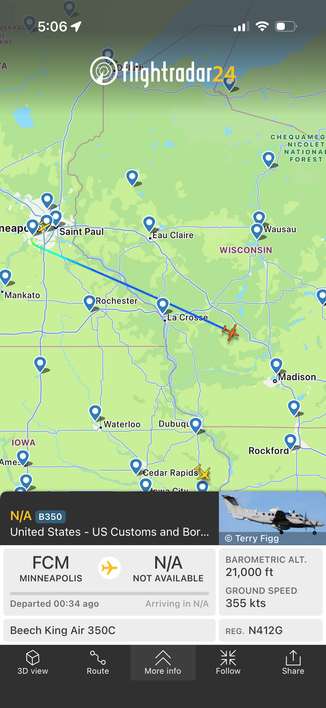 A Customs and Border Protection Beech plane leaving Minneapolis flying Southeast