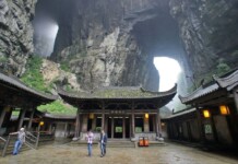 A building in an unreal location (Wulong, Chongqing, China) Tourits take picture of the building