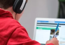 Is Udemy Legit? A person learning infront of a computer screen
