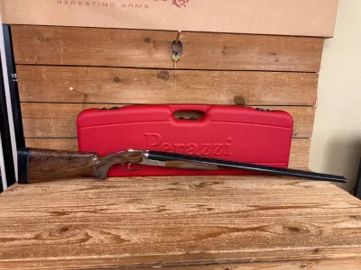 Perazzi DC12 31 1/2”, raised rib, adjustable comb, high grade wood,like new