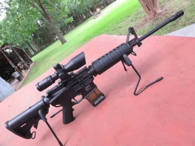 DTI-15 Sport 556/223 18" 2.5-10x40 Scope + Red Laser + Brake As New
